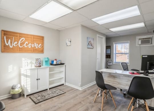 a home office with a desk and computer