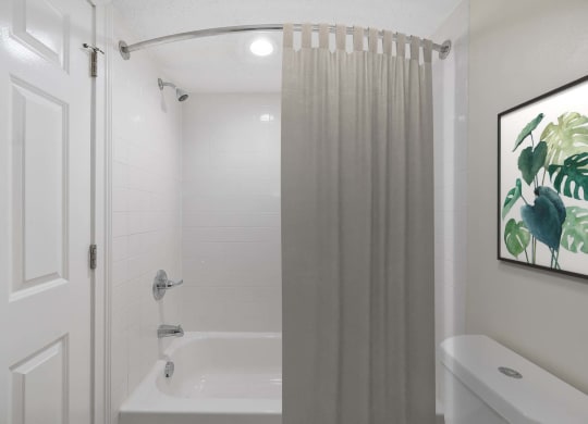 a bathroom with a shower and a toilet at Harpers Point Apartments, Cincinnati, 45249