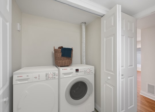 a washer and dryer in a laundry room at Harpers Point Apartments, Cincinnati, OH, 45249