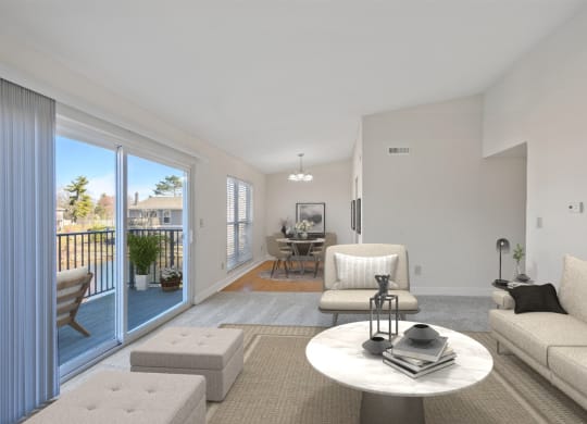 a living room with a sliding glass door that leads to a balcony at Harpers Point Apartments, Cincinnati