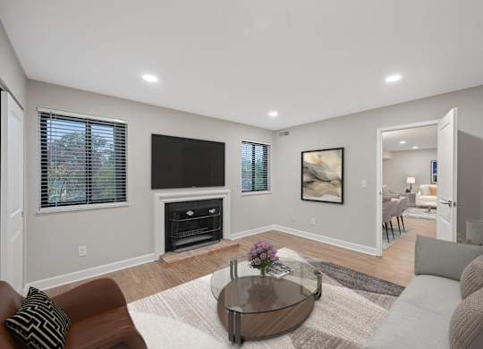 a living room with a couch and a coffee table at Indian Creek Apartments, Cincinnati, 45236