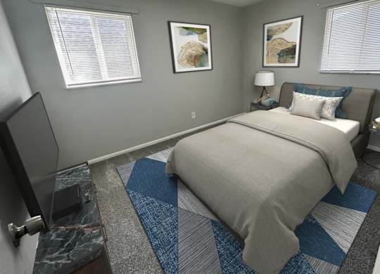 A bedroom with a bed, a television, and two pictures on the wall.