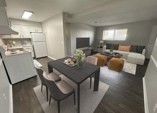 A modern kitchen with a dining table and chairs.