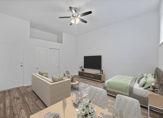 A modern living room with a television, couch, and dining table.