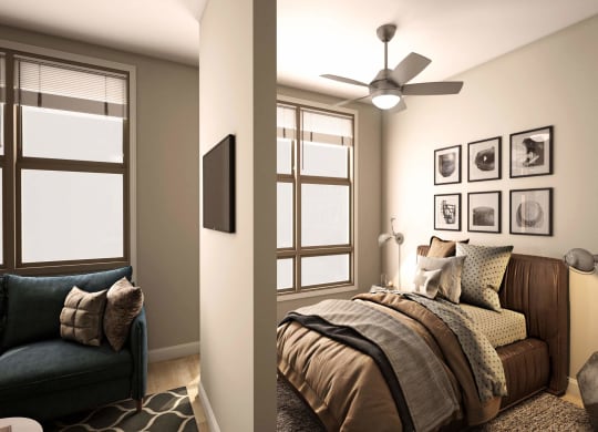 a bedroom with a bed and a ceiling fan at Adelphi Quarter, Columbus, Ohio