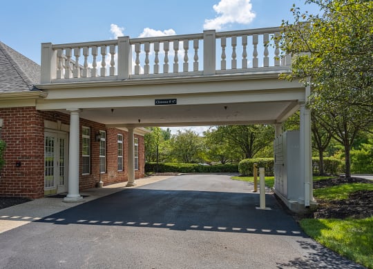 a house with a white balcony on top of a driveway at Bishops Gate, Ohio, 45249