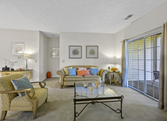 Living room with sofa and center table at Bishops Gate, Ohio