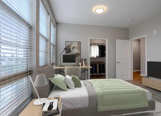a bedroom with a bed and a desk with a tv at Adelphi Quarter, Columbus, Ohio