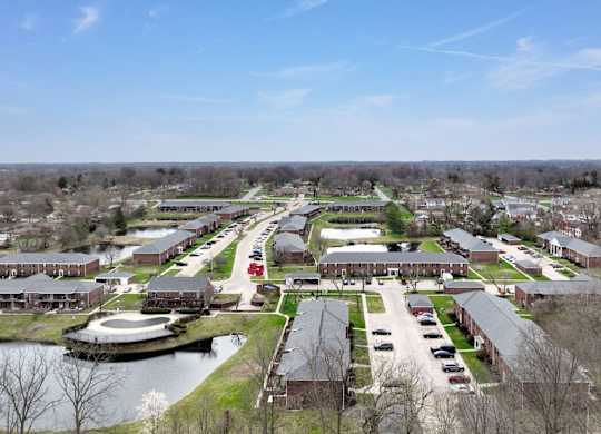 View of campus with a lake and buildings at Meridian Court South, Indianapolis, IN, 46217
