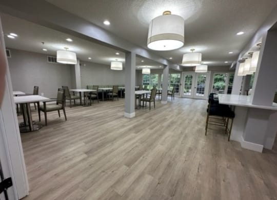 a large room with tables and chairs