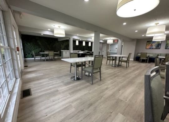 a large room with tables and chairs