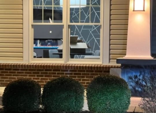 House with three hedge balls in front of it  at Waterstone Landing, Perrysburg, 43551