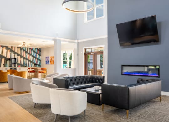 Living room with couches and chairs and a television at Waterstone Landing, Perrysburg, OH, 43551
