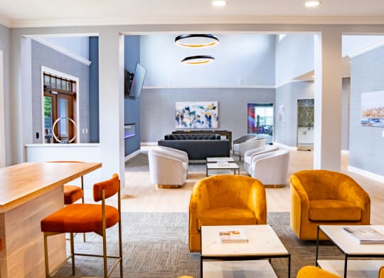 Living room with chairs and tables and a couch at Waterstone Landing, Perrysburg, OH