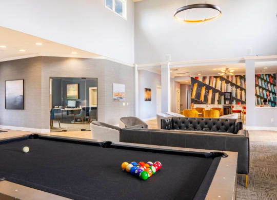 Game room with a pool table and couches at Waterstone Landing, Perrysburg, OH, 43551