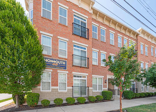 A red brick building with the word Monmouth on it.
