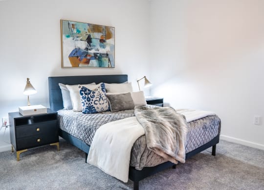 a bedroom with a bed and two nightstands  at Waterstone Landing, Ohio, 43551