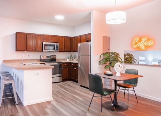 a kitchen and dining area in a 555 waverly unit  at Waterstone Landing, Perrysburg, Ohio