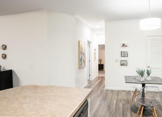 a kitchen and dining area in a 555 waverly unit at Waterstone Landing, Ohio, 43551