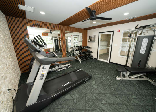 Gym with a treadmill and other exercise equipment at Honey Creek, IN, 46143