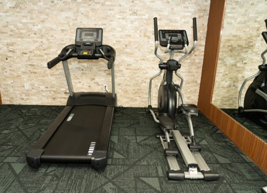 Two exercise machines in a gym at Honey Creek, Greenwood