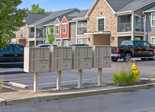 Street sign with mailboxes in front of a row of houses at Galbraith Pointe Apartments and Townhomes, Cincinnati, Ohio
