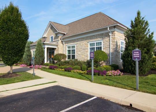 a house with a purple sign in front of it at Grove City Summit Apartments, Grove City