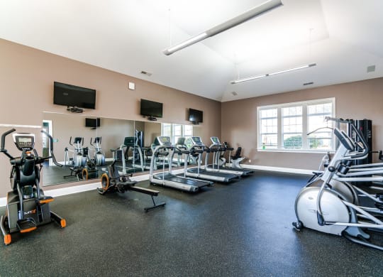 the gym with cardio equipment at the apartments at Grove City Summit Apartments, Ohio, 43123
