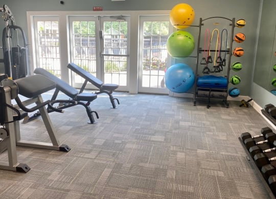 Fitness center with treadmills and other exercise equipment at Merrick Place, Lexington, KY, 40502