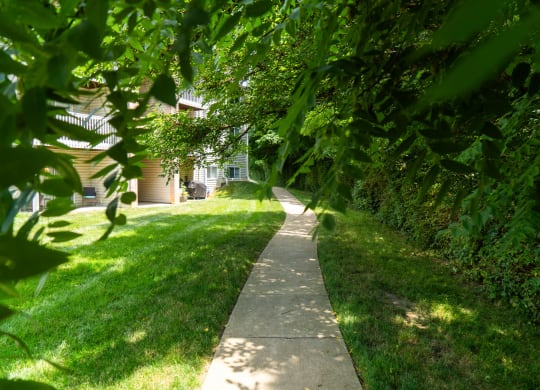 Walkway through the grass in front of a house at Honey Creek, Greenwood