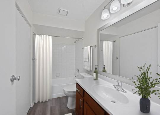 the preserve at ballantyne commons apartment bathroom with sink and mirror at Normandy Club Apartments, Centerville, OH
