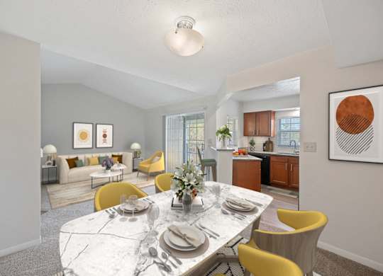 a living room and dining room with a marble table and chairs at Normandy Club Apartments, Centerville, Ohio
