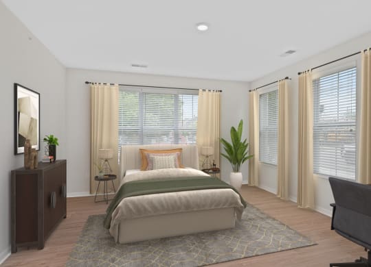 a bedroom with a bed and a desk and windows at Monmouth Row Apartments, Kentucky