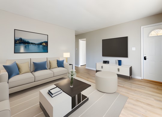 a living room with a couch and a coffee table at Stonebrook of Franklin, Franklin, 46131