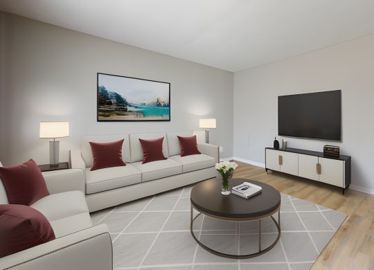a living room with couches and a coffee table at Stonebrook of Franklin, Franklin, IN, 46131