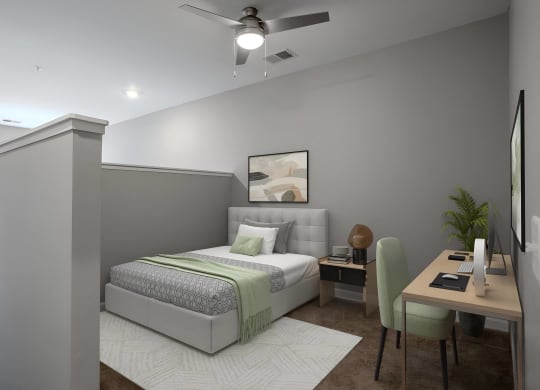 a bedroom with a bed and a desk and a ceiling fan at Adelphi Quarter, Columbus