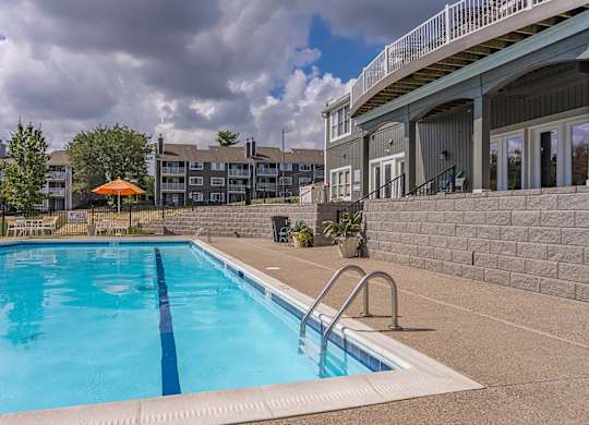 A swimming pool with a blue line in the middle.