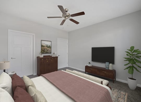 a bedroom with a large bed and a ceiling fan at Monmouth Row Apartments, Newport, KY