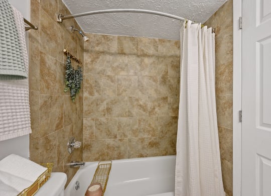 Bathroom with a shower and a tub and a shower curtain at Wrights Point,  41011