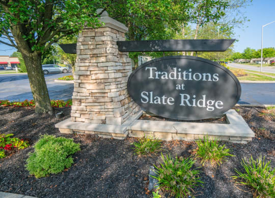 a sign that says traditions at slate ridge on the side of a street at Slate Ridge, Reynoldsburg, OH 43068
