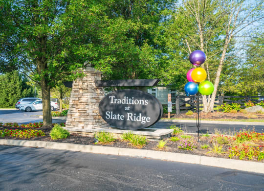 the sign for traditions at state at the entrance to the park