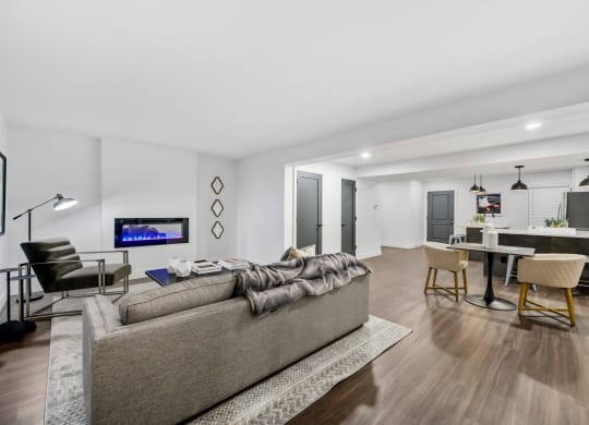 a living room and dining area in a 555 waverly unit