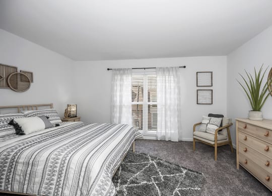 Bedroom with bed and cupboard at SoDel, Kettering, OH, 45429
