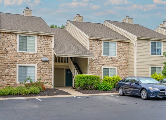 a car parked in a parking lot in front of a building at Enclave, Ohio, 45431