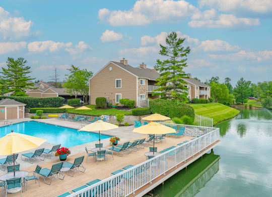 take a dip in the swimming pool at villas at houston levee west apartments in at Enclave, Beavercreek, Ohio