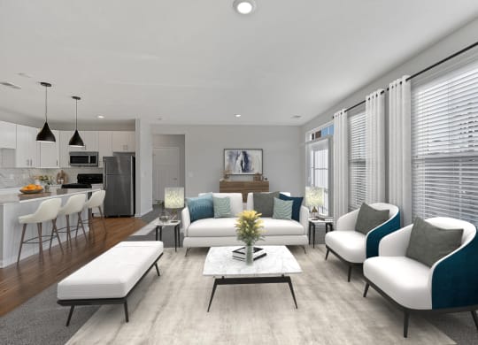 an open living room with a kitchen and dining area at Monmouth Row Apartments, Newport, KY, 41071