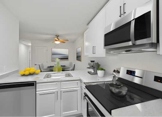 a kitchen with white cabinets and a counter top and a sink