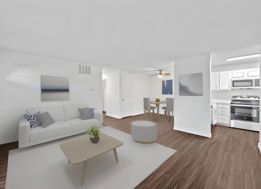 a living room with a white couch and a coffee table