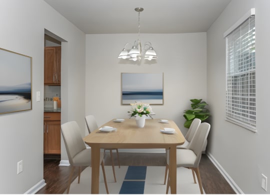 a dining room with a table and chairs and a chandelier