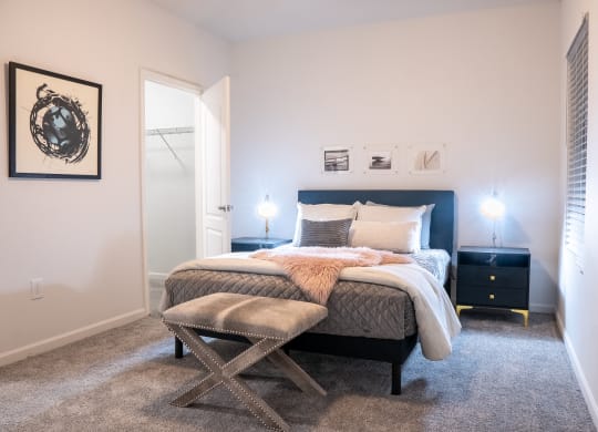 a bedroom with a bed and two night stands at Waterstone Landing, Perrysburg, 43551